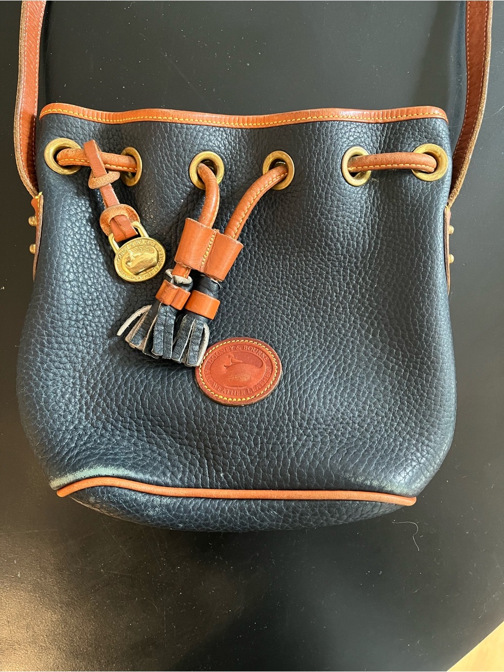 Vintage Dooney & Bourke Navy Pebble Leather Drawstring Crossbody with Tan Trim